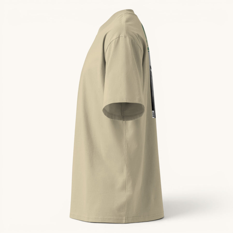 ETHIKKALL T-shirt beige ample en coton biologique avec col montant et épaules tombantes, idéal pour le streetwear.