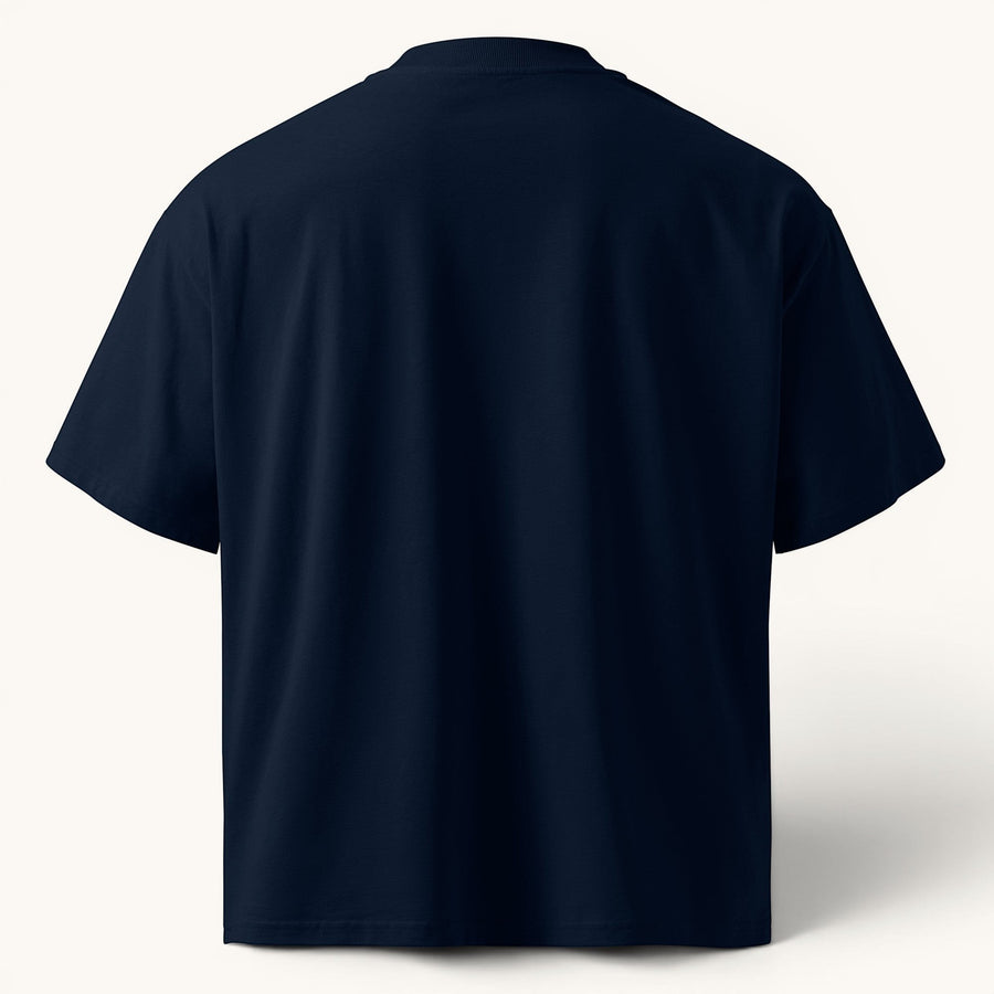 ETHIKKALL T-shirt bleu marine ample en coton biologique avec épaules tombantes et col rond.