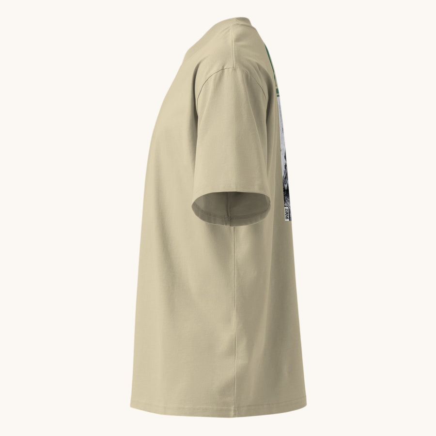 T-shirt ample ETHIKKALL en coton biologique beige avec col montant et épaules tombantes, parfait pour le streetwear.