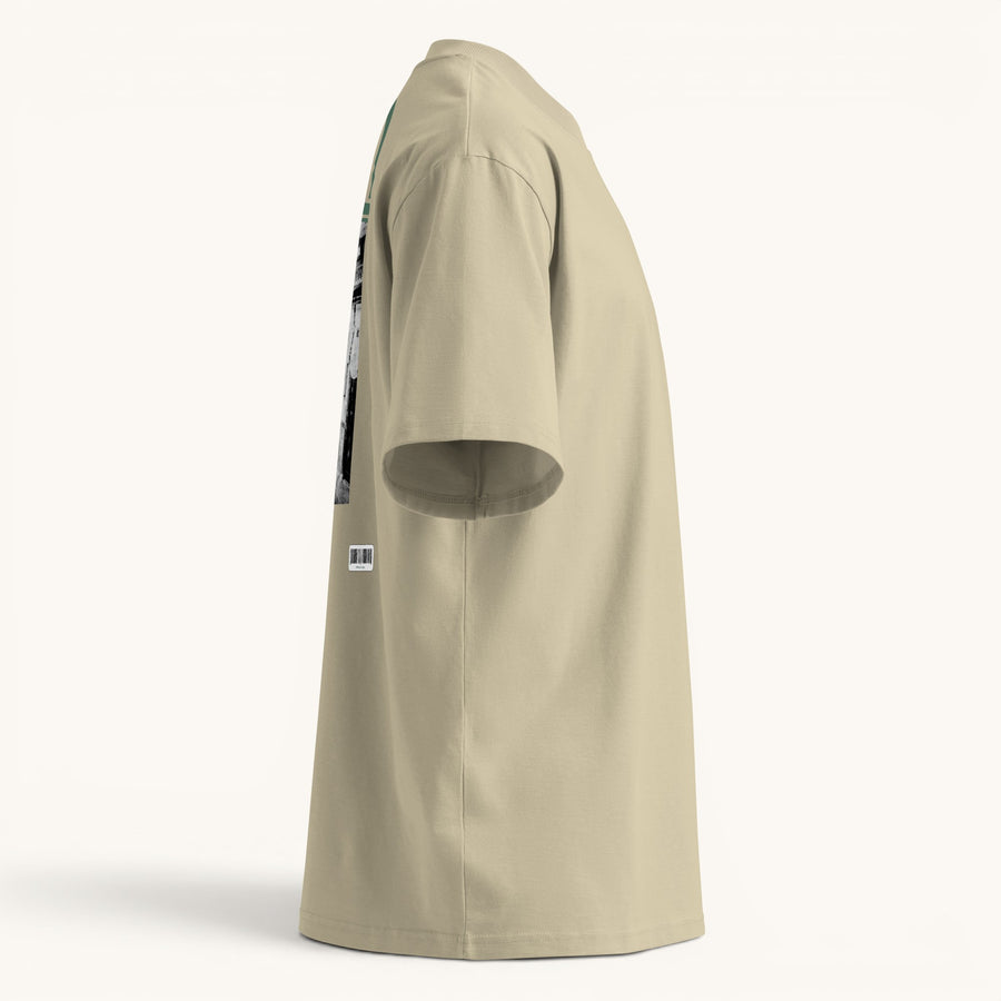 ETHIKKALL T-shirt ample beige en coton biologique avec col montant et épaules tombantes, idéal pour le streetwear.