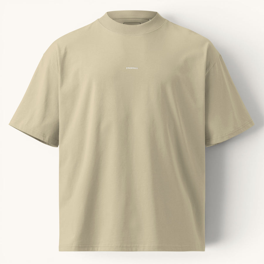 T-shirt ample ETHIKKALL beige en coton biologique avec col montant et épaules tombantes, idéal pour un style streetwear.