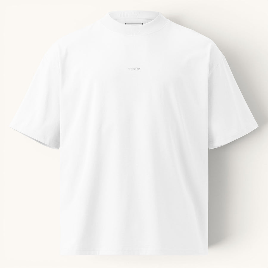 T-shirt blanc ample ETHIKKALL en coton biologique avec col montant et épaules tombantes, idéal pour un look streetwear.