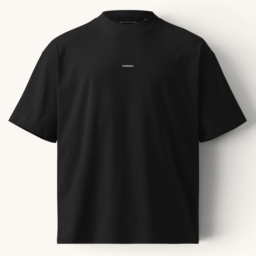 ETHIKKALL T-shirt noir ample en coton biologique avec col montant et épaules tombantes, idéal pour le streetwear.