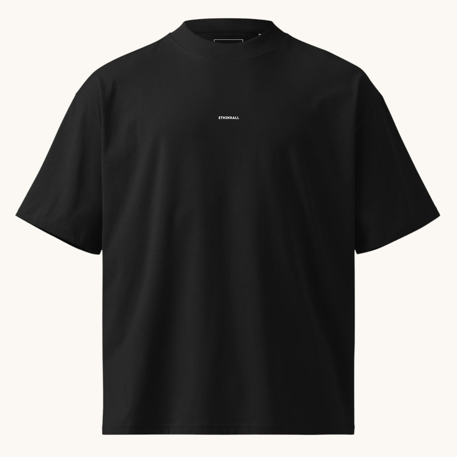 ETHIKKALL T-shirt noir ample en coton biologique avec col montant et épaules tombantes, idéal pour le streetwear.