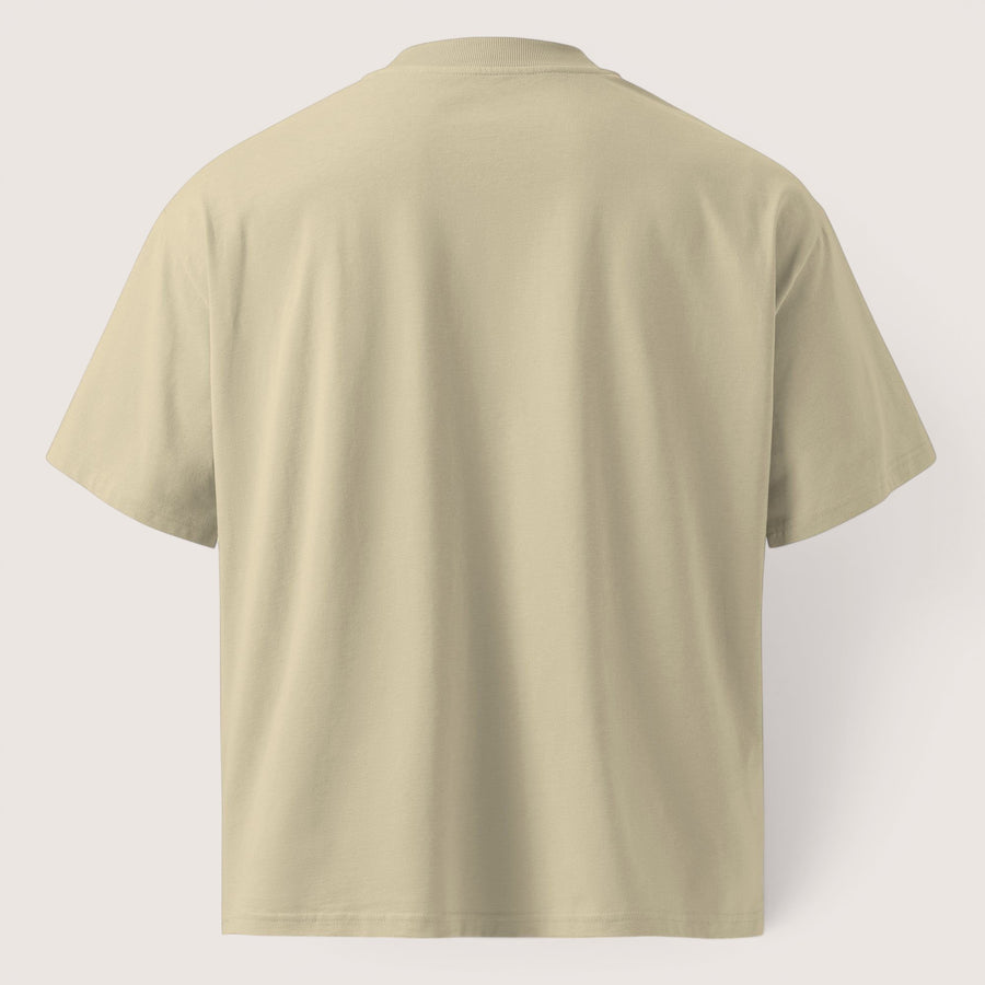 ETHIKKALL T-shirt ample beige en coton biologique avec épaules tombantes et col rond pour un style streetwear.
