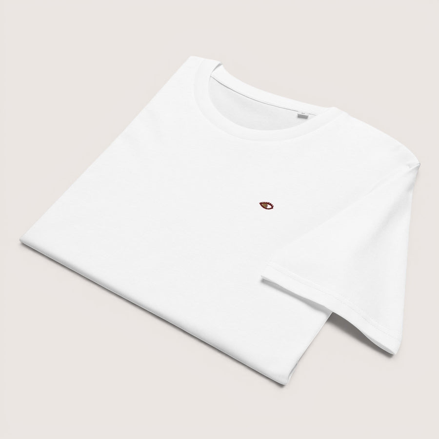 ETHIKKALL t-shirt blanc en coton biologique avec un petit œil brodé sur la poitrine. Coupe droite, col rond.