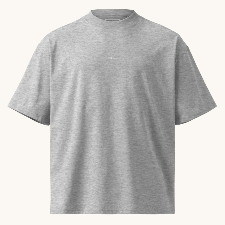 ETHIKKALL T-shirt gris ample en coton biologique avec col montant et épaules tombantes, idéal pour le streetwear.