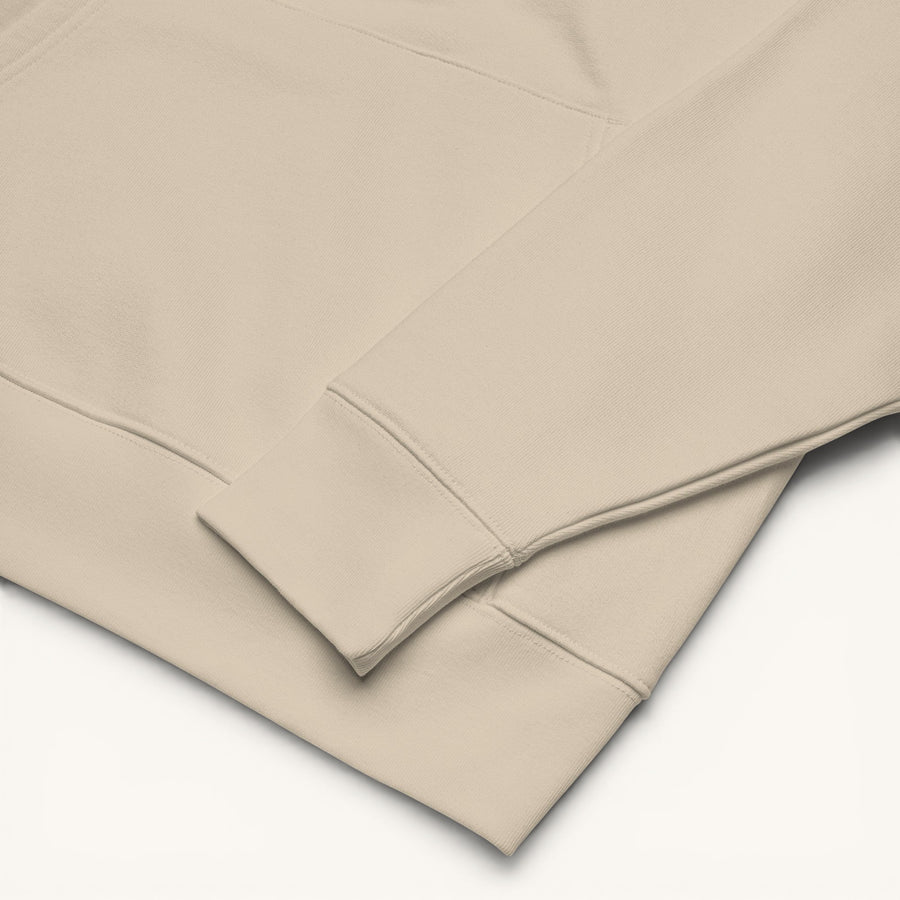 ETHIKKALL sweat à capuche unisexe beige en coton organique, avec poche kangourou et capuche doublée.