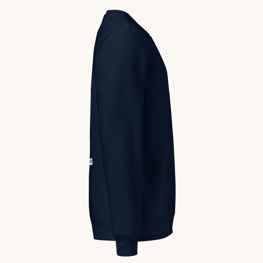 ETHIKKALL sweat-shirt bleu marine en coton biologique avec détail demi-lune à l'arrière, coupe décontractée.