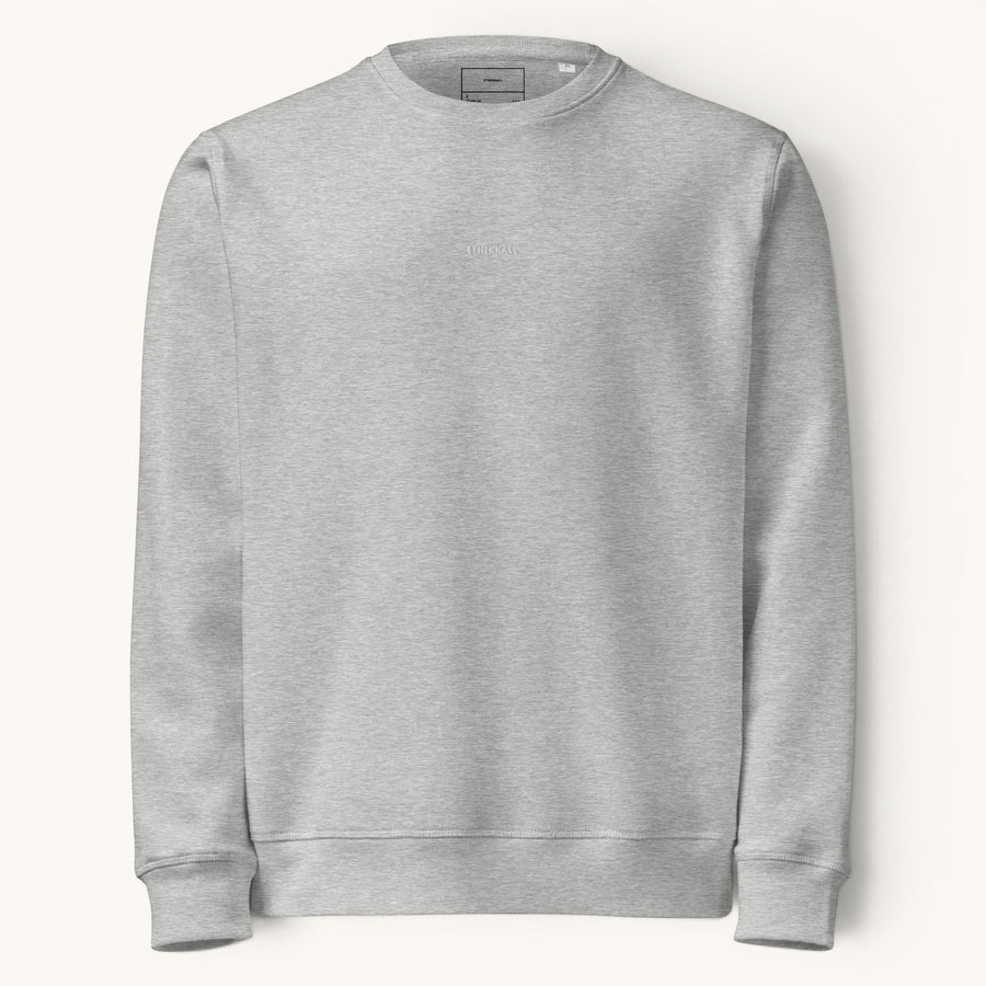 ETHIKKALL sweat gris en coton biologique avec détail demi-lune discret au dos, coupe décontractée.