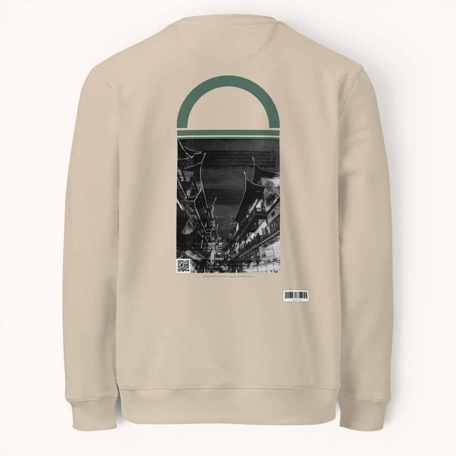 ETHIKKALL sweat-shirt beige en coton biologique avec un imprimé architectural de Shanghai et un détail en demi-lune.