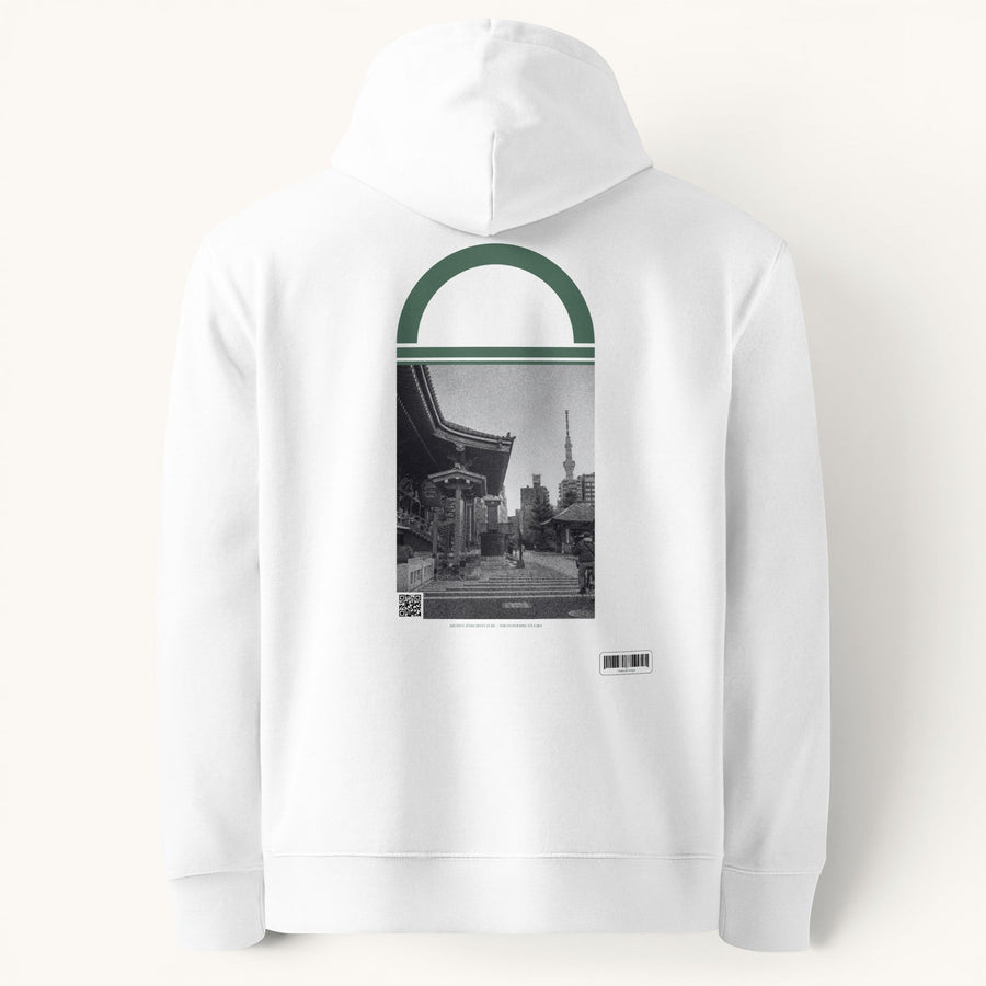 Sweat à capuche blanc ETHIKKALL en coton avec illustration Tokyo 004 sur le dos, logo discret sur la poitrine.