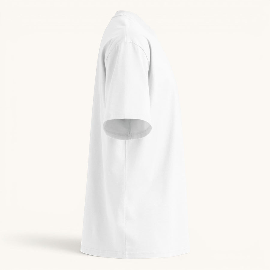 ETHIKKALL T-shirt blanc ample en coton biologique avec épaules tombantes et col rond.