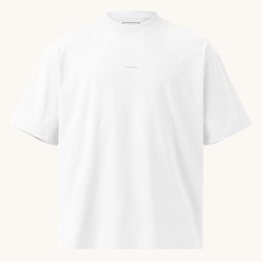 ETHIKKALL T-shirt blanc ample en coton biologique avec col montant et épaules tombantes, idéal pour le streetwear.