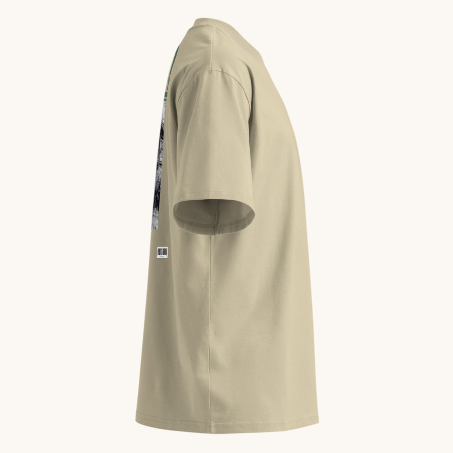 ETHIKKALL T-shirt ample beige en coton biologique avec col montant et épaules tombantes, idéal pour le streetwear.