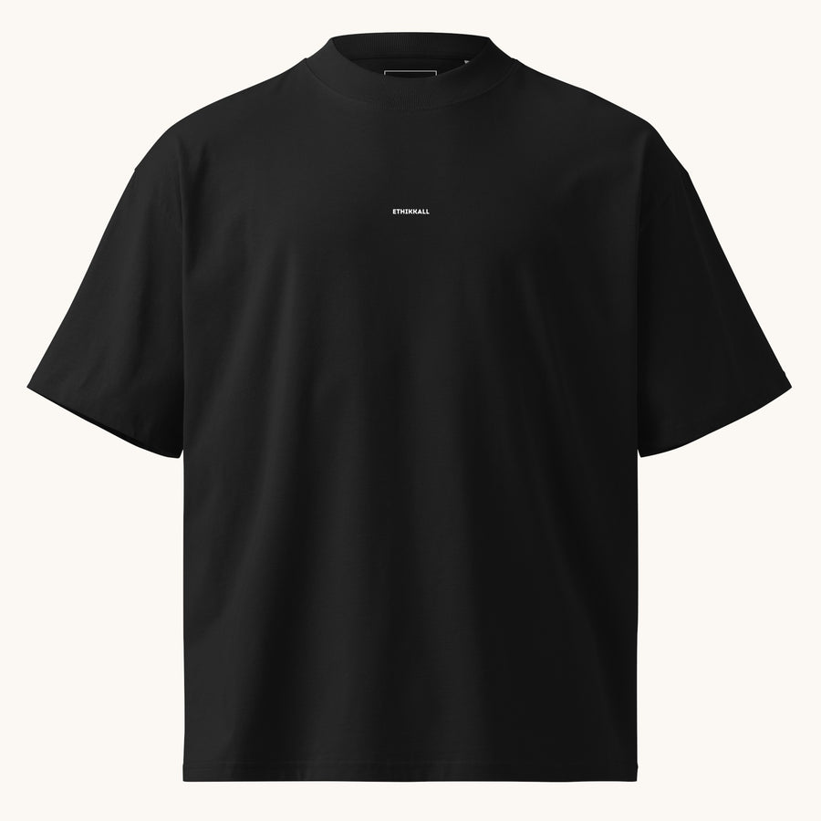 ETHIKKALL T-shirt noir ample en coton biologique avec col montant et épaules tombantes, idéal pour le streetwear.