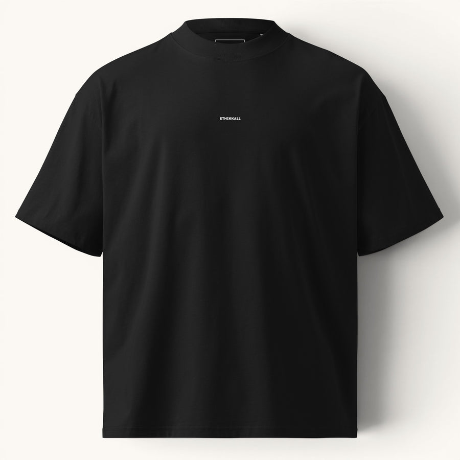 ETHIKKALL T-shirt noir ample en coton biologique avec col montant et épaules tombantes, idéal pour le streetwear.