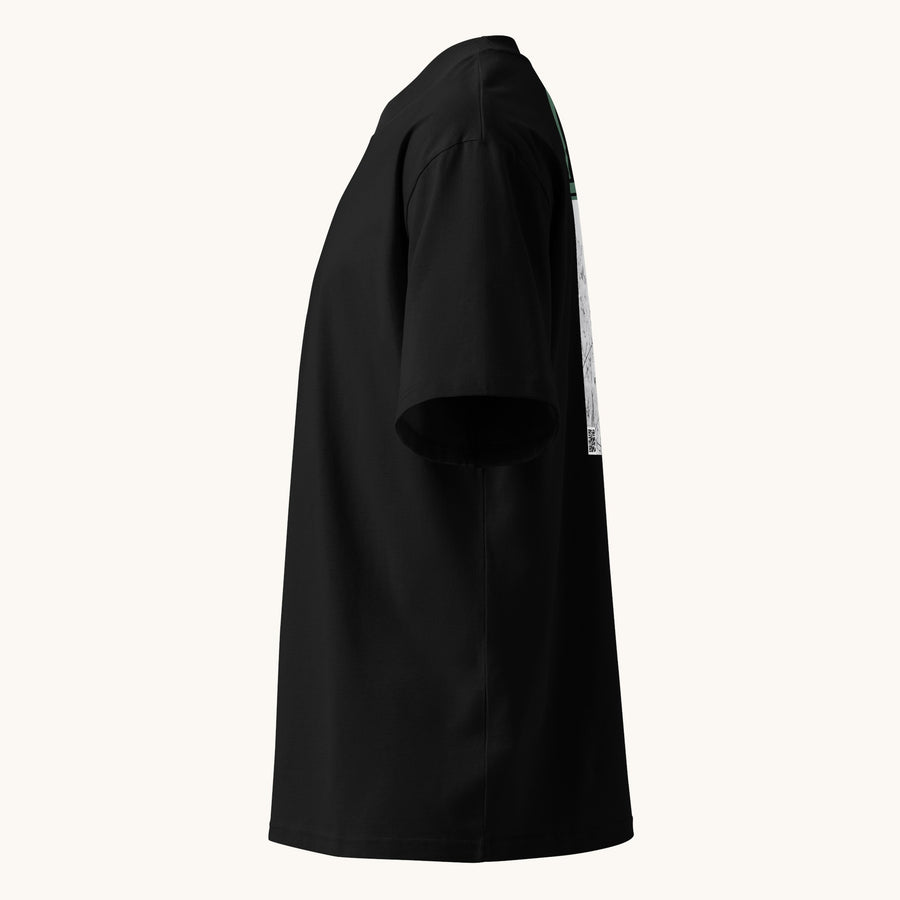 ETHIKKALL T-shirt noir ample en coton biologique avec col montant et épaules tombantes, style streetwear.
