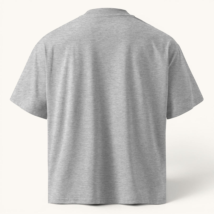 ETHIKKALL T-shirt gris ample en coton biologique avec épaules tombantes et col rond, idéal pour le streetwear.