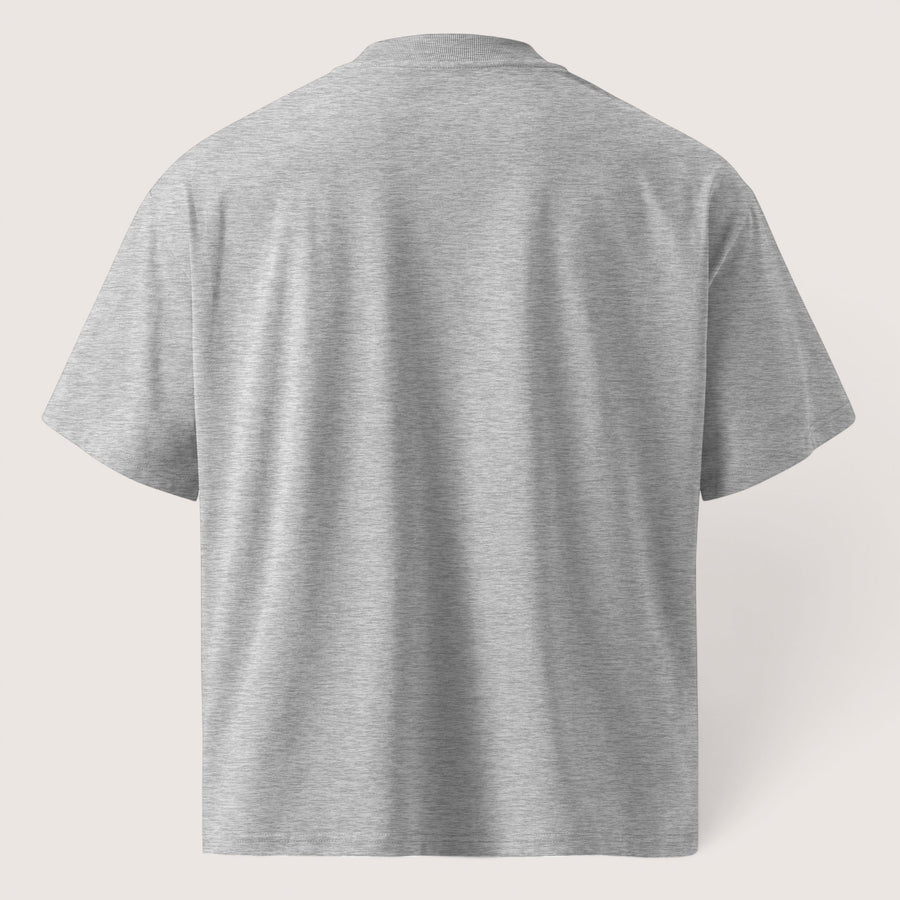 ETHIKKALL T-shirt gris ample en coton biologique avec épaules tombantes et col rond, idéal pour le streetwear.