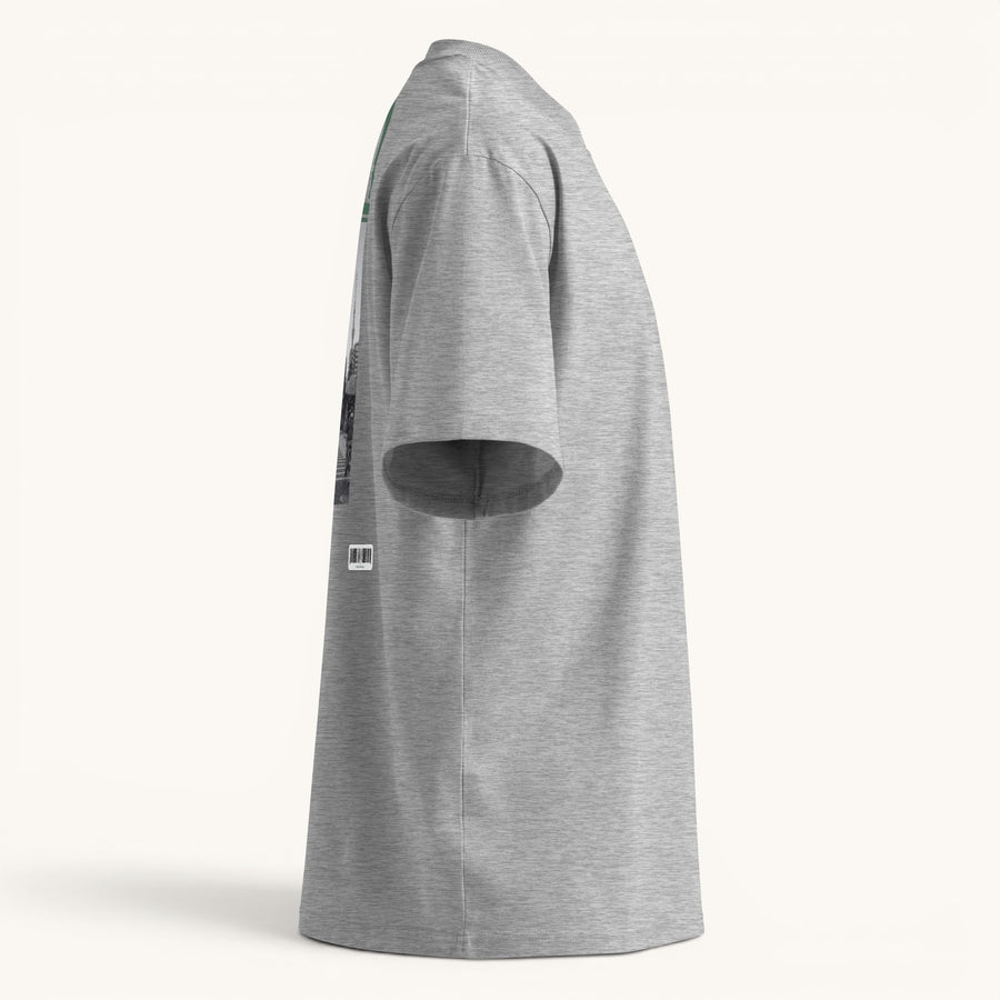 ETHIKKALL T-shirt gris ample en coton biologique avec col montant et épaules tombantes, idéal pour le streetwear.