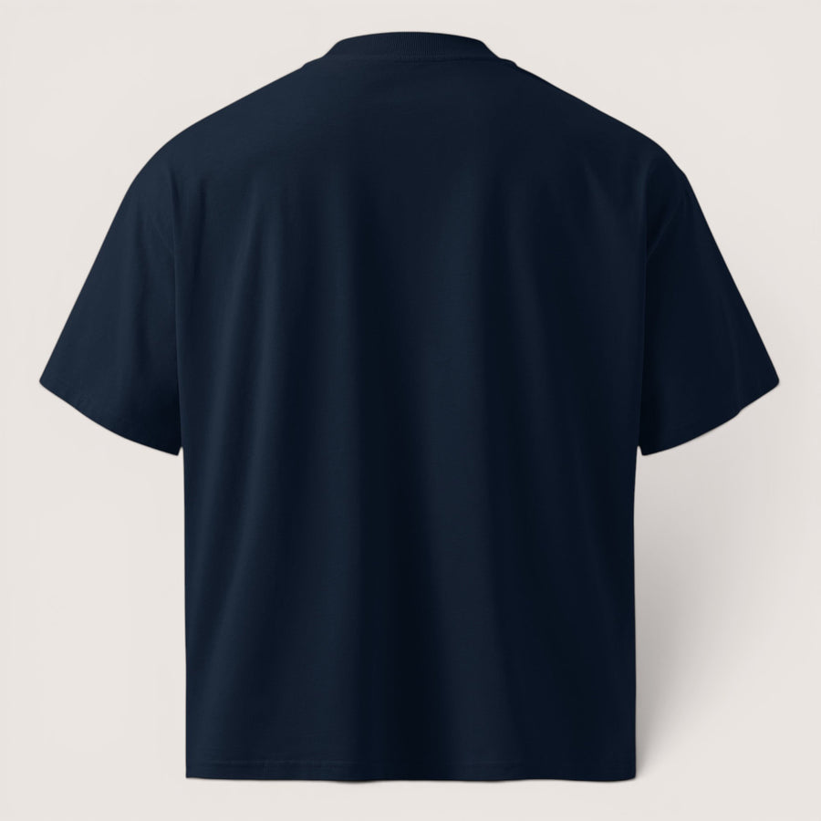Vue arrière du t-shirt oversize bleu marine ETHIKKALL en coton biologique dense avec col montant